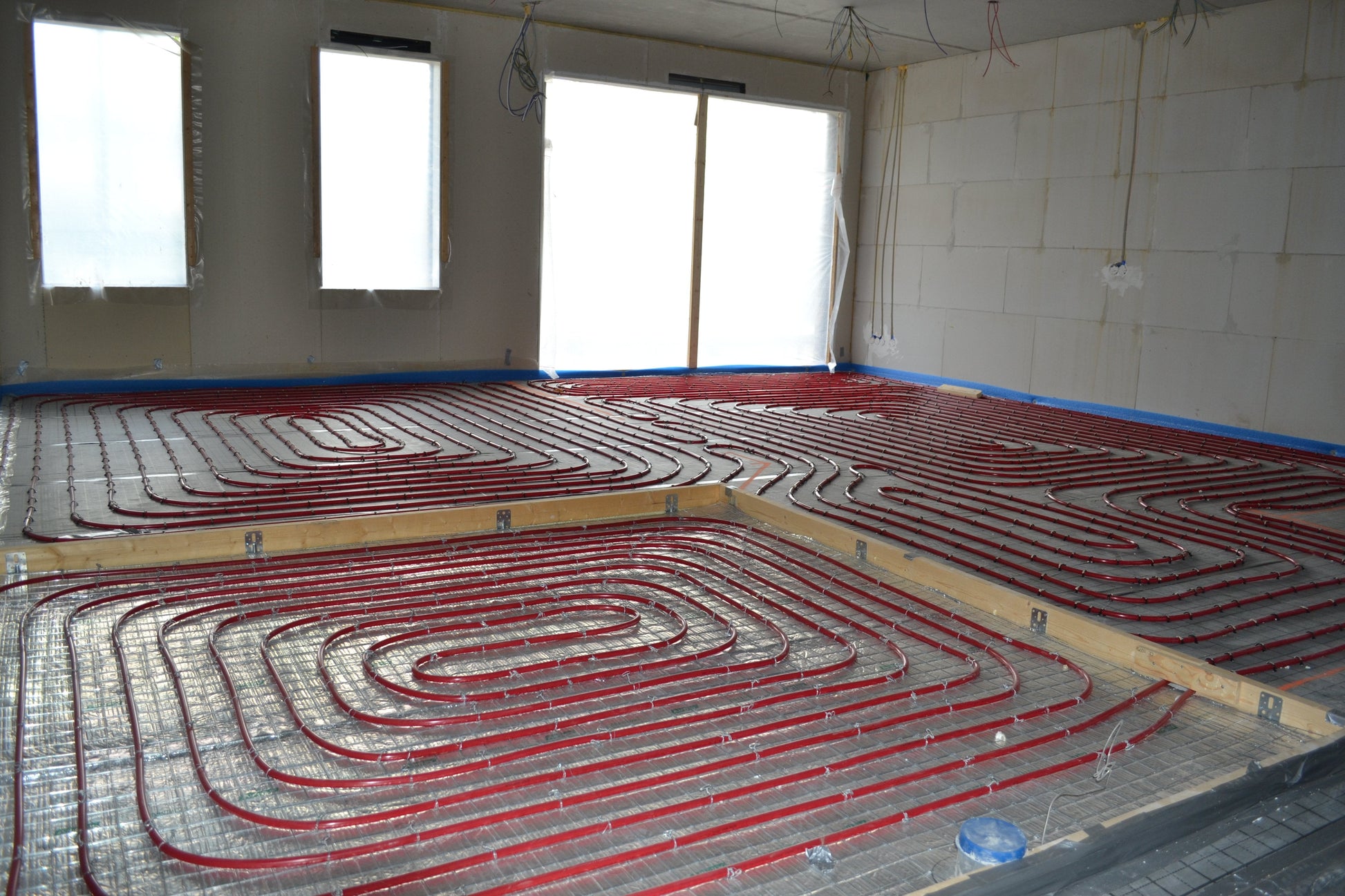Montage van ISO Alu-Air isolatiefolie als vloerisolatie bij vloerverwarming.